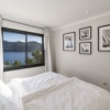 Stilfuld lejlighed i beach house-design – Første havlinje med stor terrasse og pool – 13